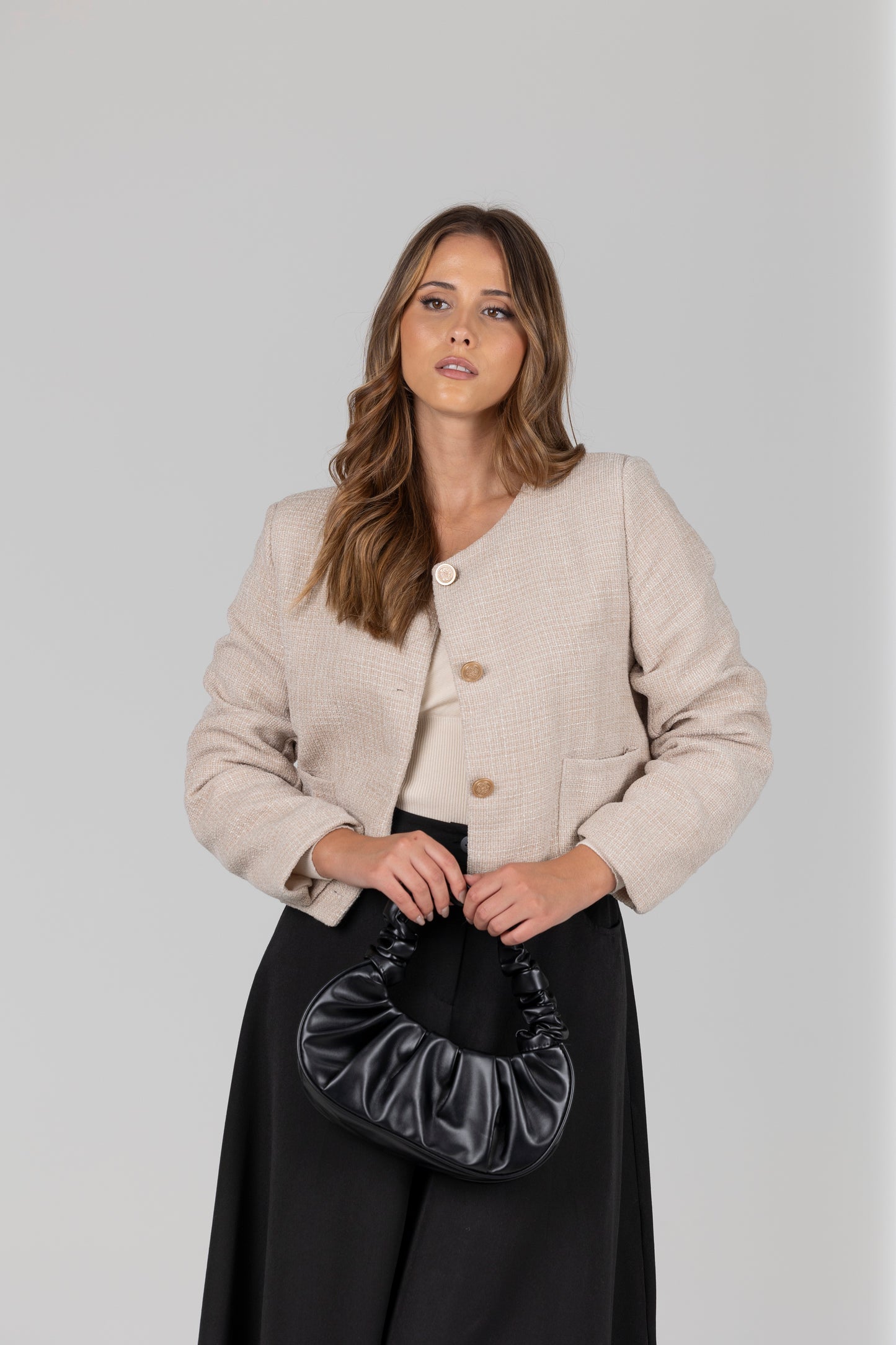 Casaco tweed bolsos