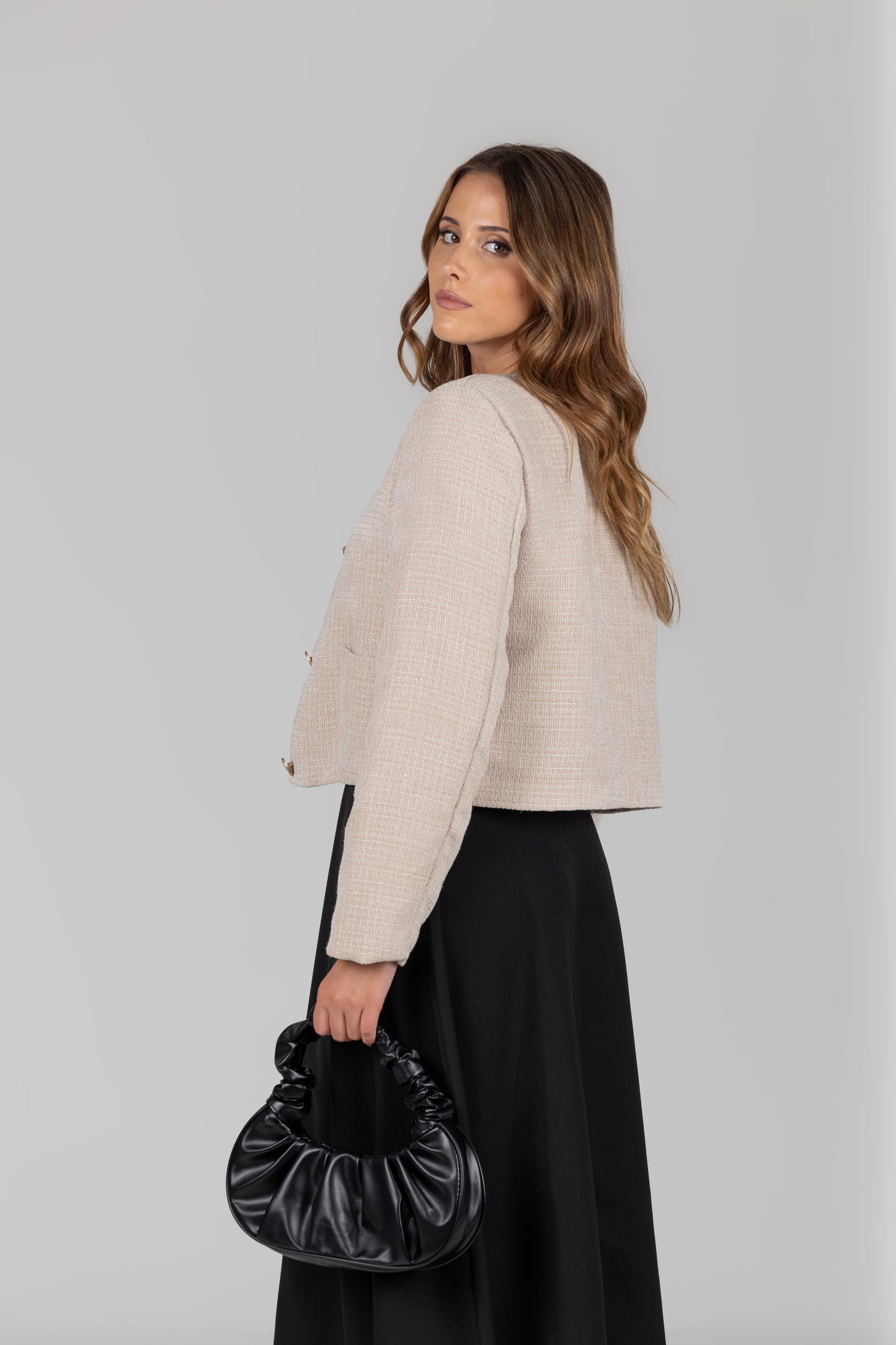 Casaco tweed bolsos