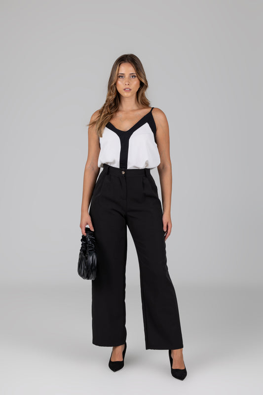 Calça fluida com bolsos